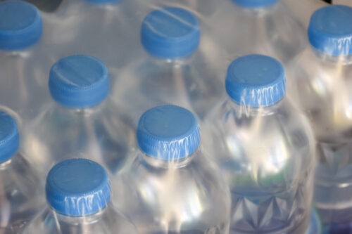 Pack of clear plastic water bottles shrink wrapped
